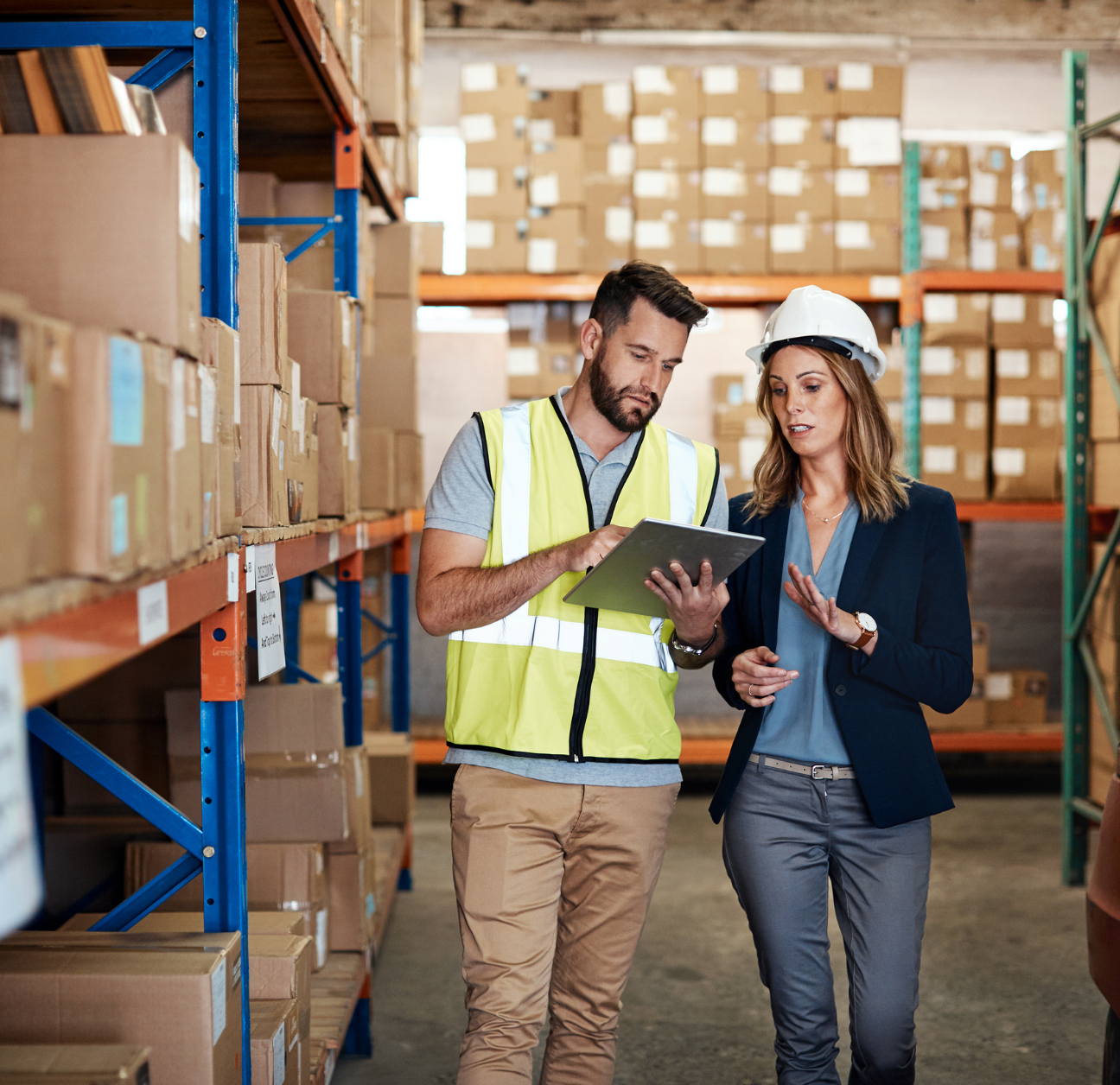 Supply chain workers researching supply chain software integrations with Chain.io.