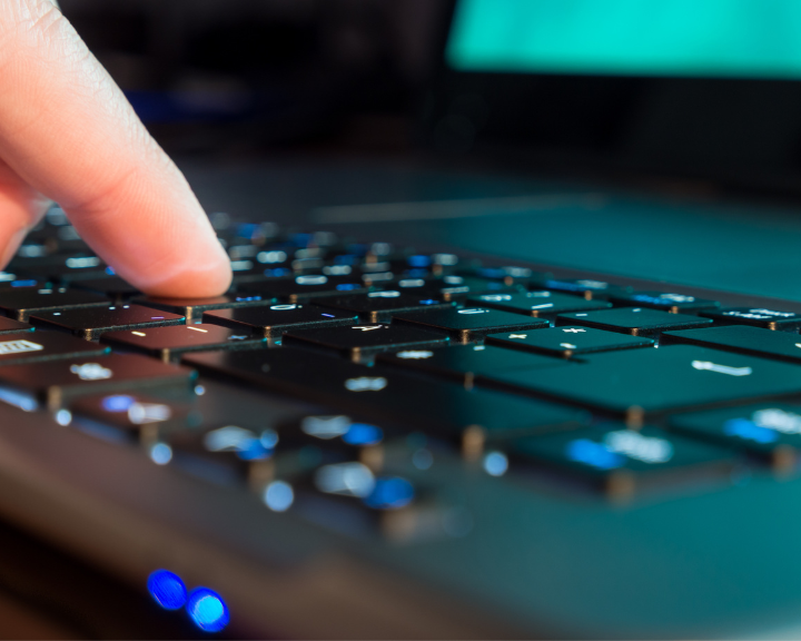 Person using supply chain visibility software. 