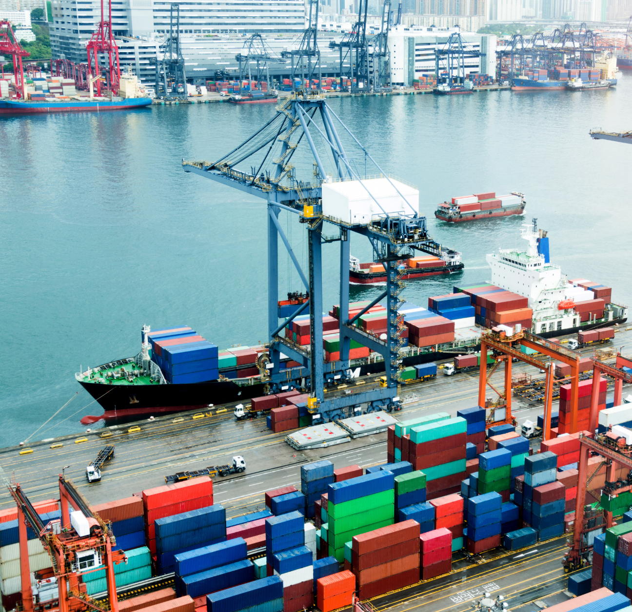 Ship being unloaded into port with all shipments being tracked through supply chain automations